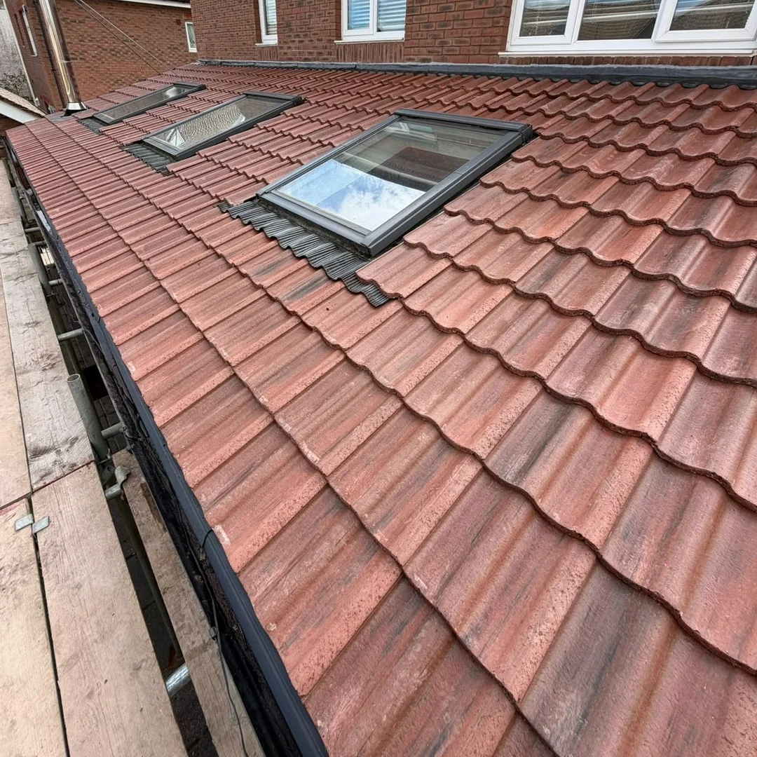New tiled roof with Velux windows by Roofing South West